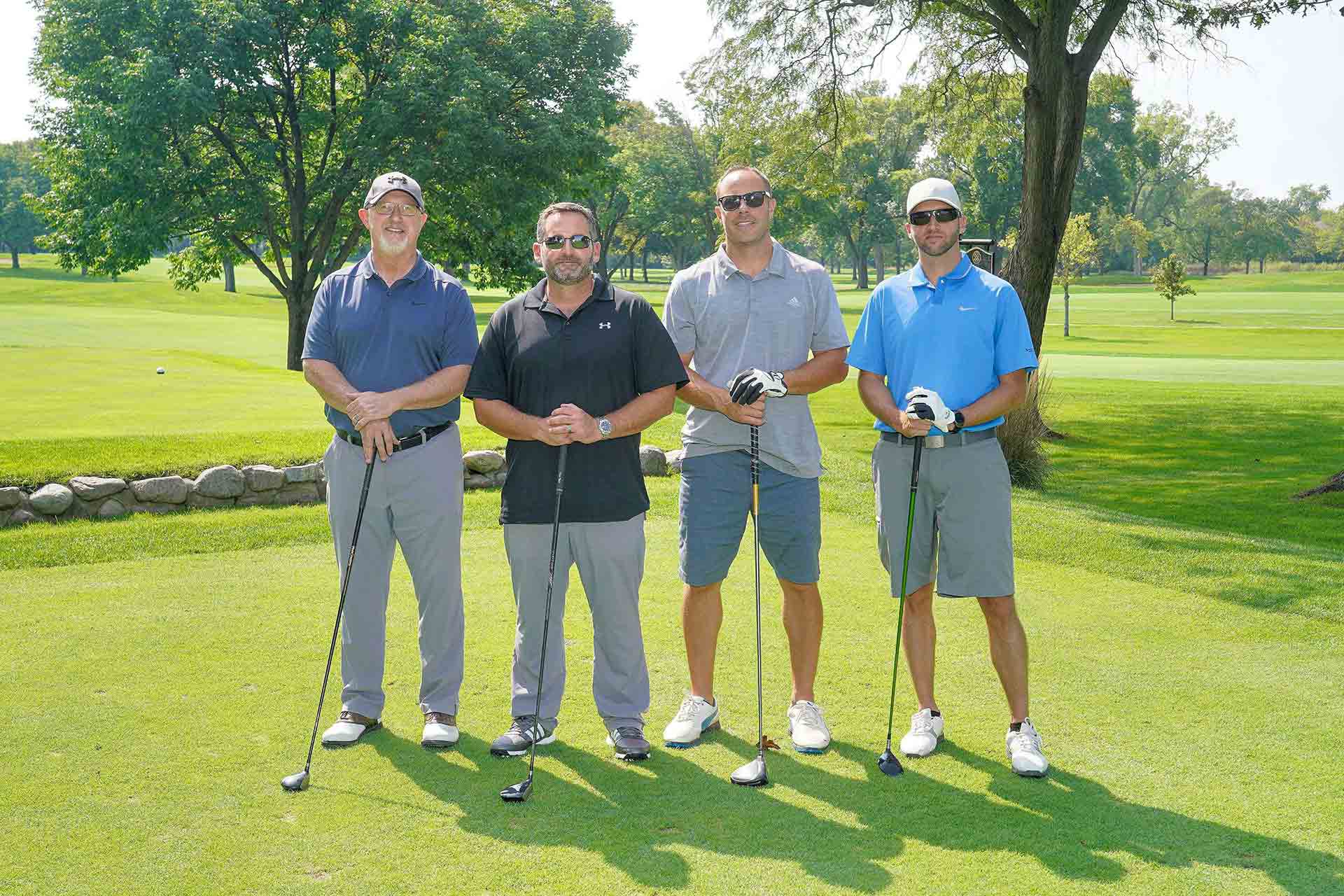 2019-endowment-classic-foru-men-with-golf-clubs