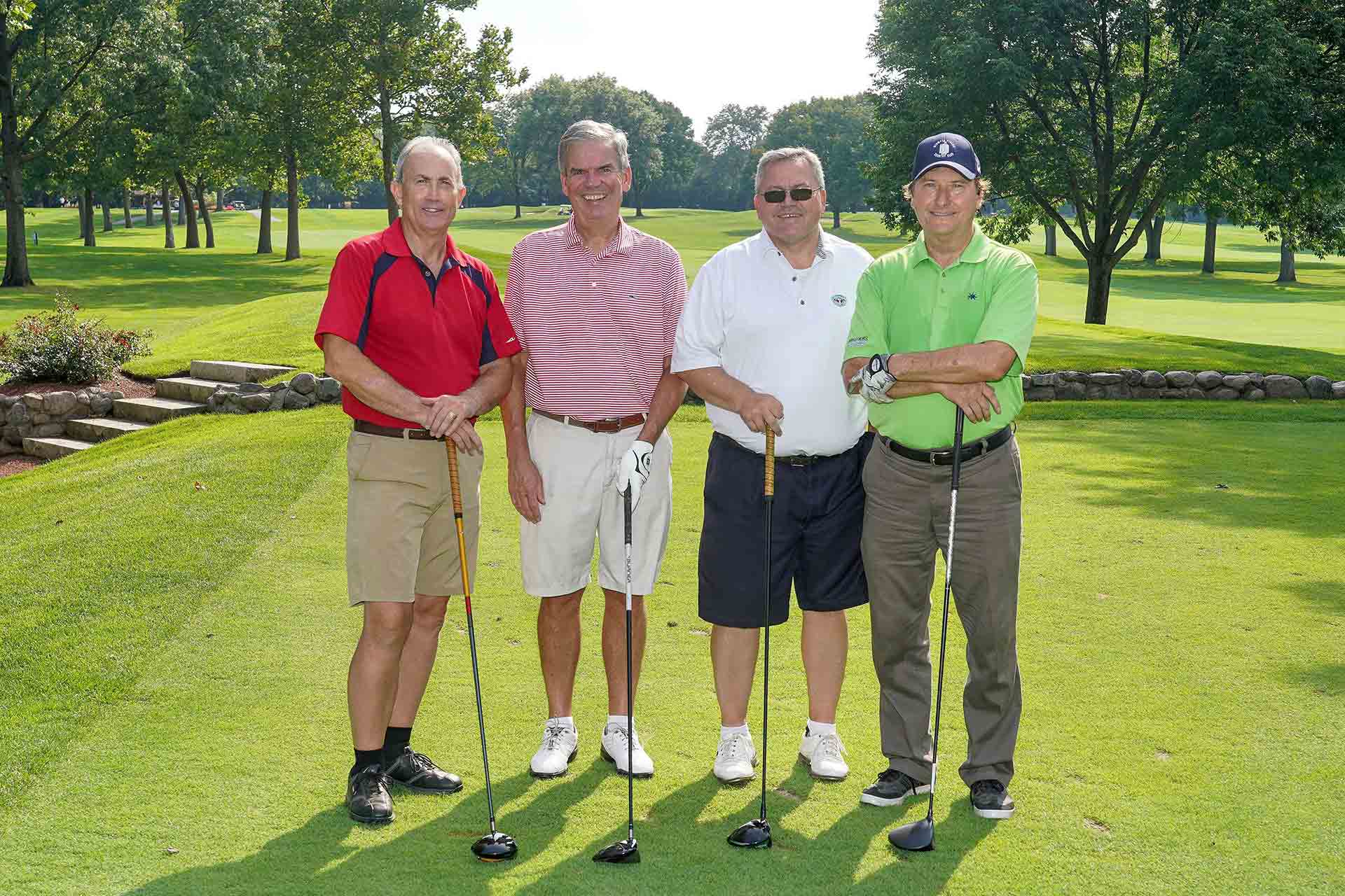 2019-endowment-classic-four-golfers-with-clubs