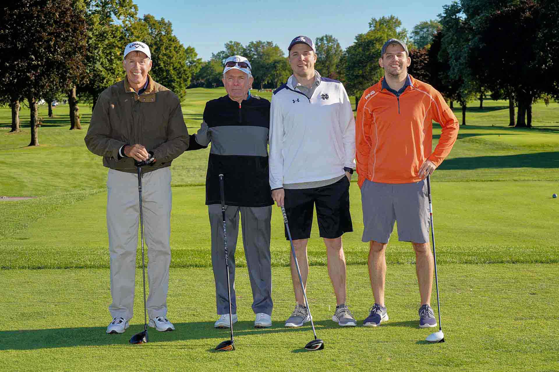 2020-endownment-classic-four-golfers-smiling