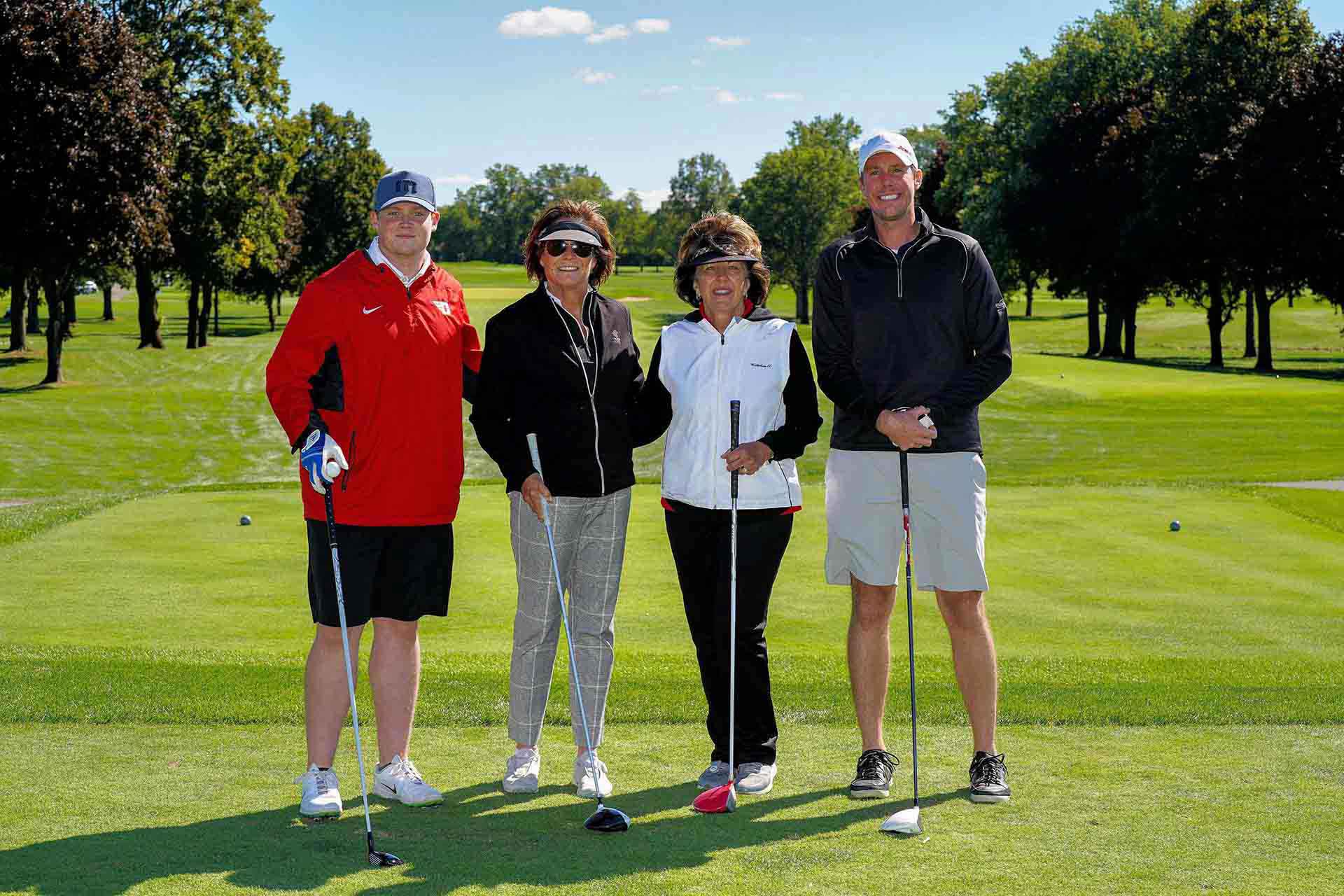 2020-endownment-classic-smiling-group-on-golf-course