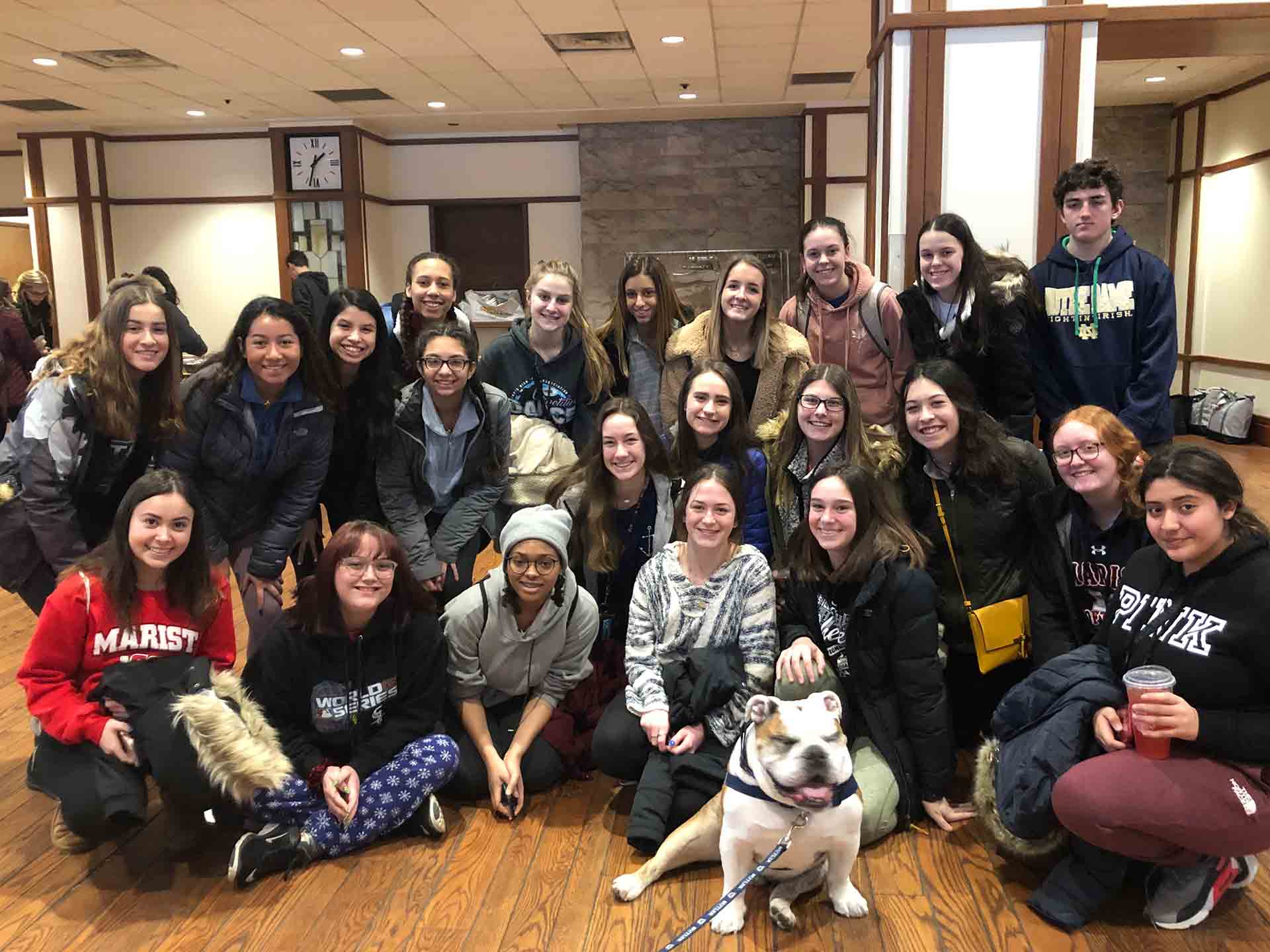 2020-explore-college-tour-student-group-photo-with-a-dog