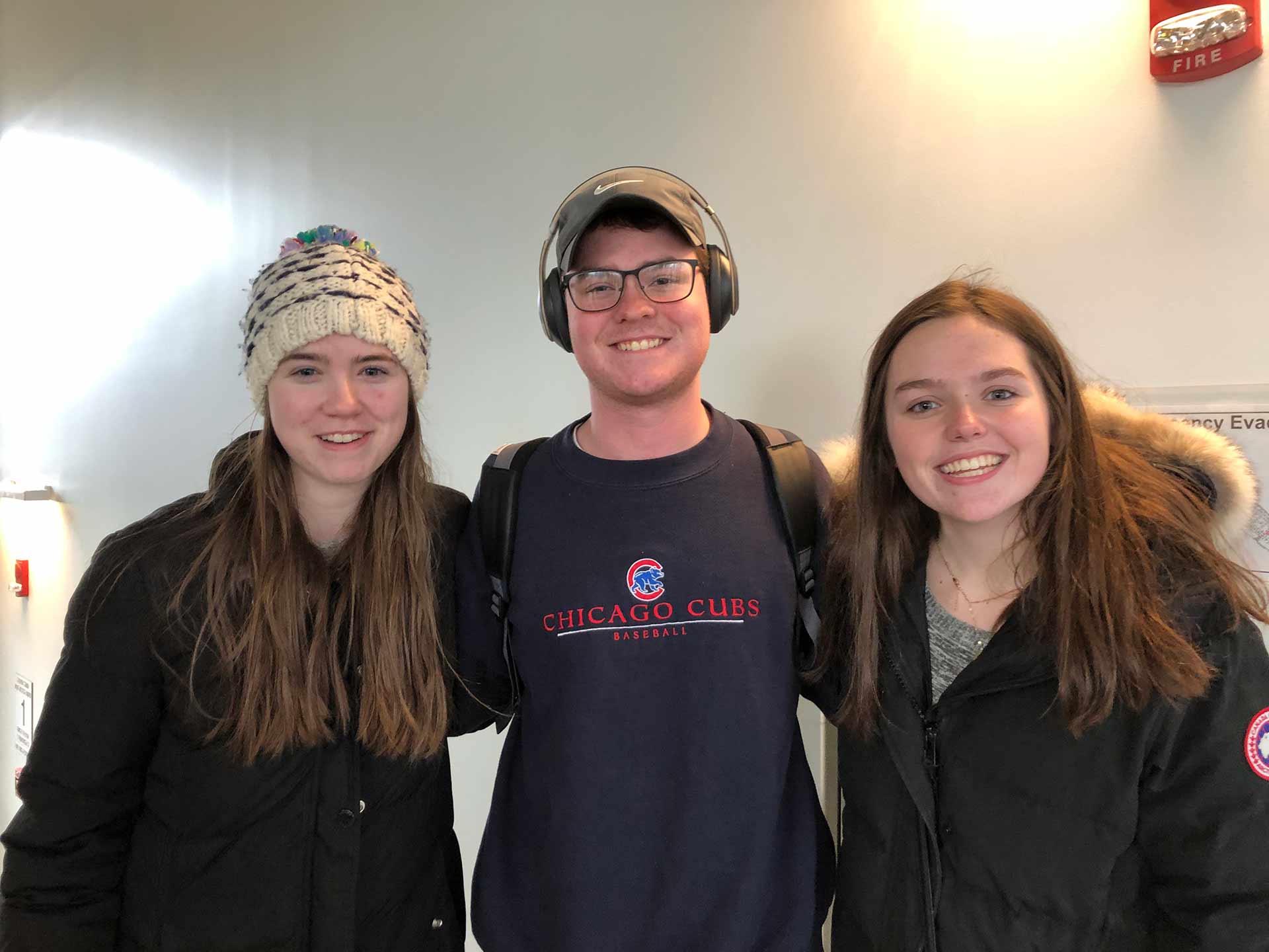 2020-explore-college-tour-three-students-smiling
