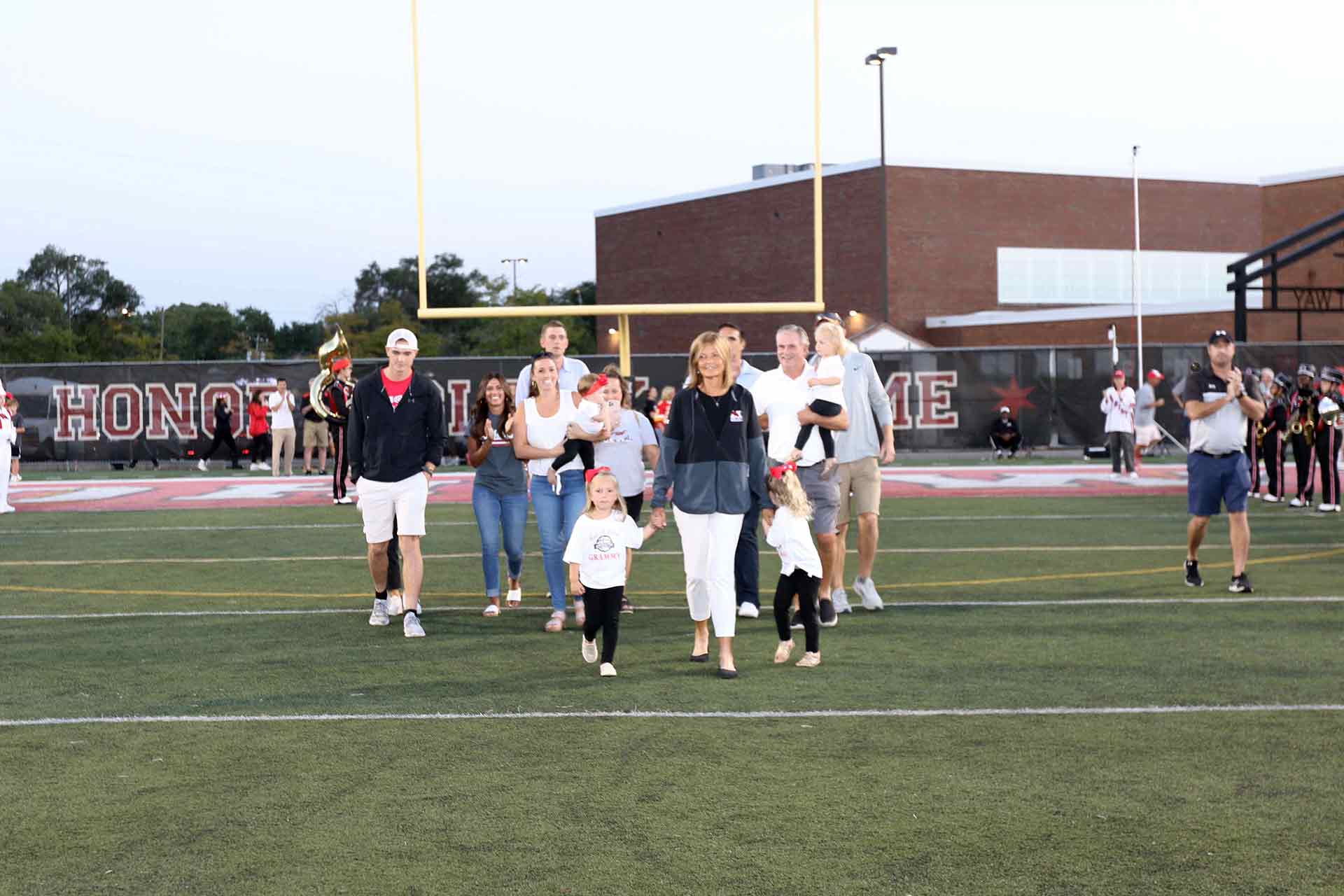 2021-hall-of-fame-ceremony-connolly-walking-on-field