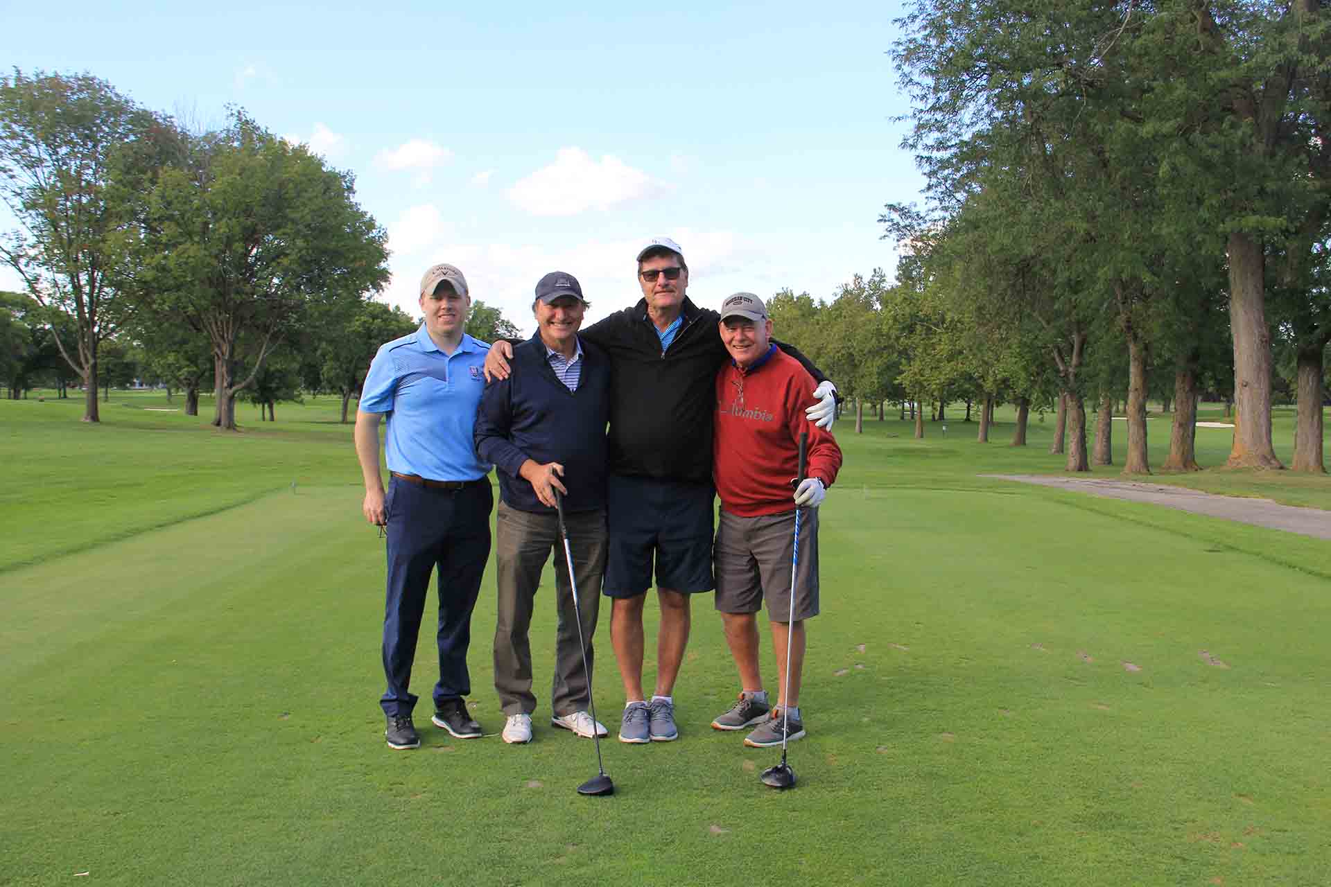 2022-Endowment-Golf-Classic-four-golfers-pose-for-picture