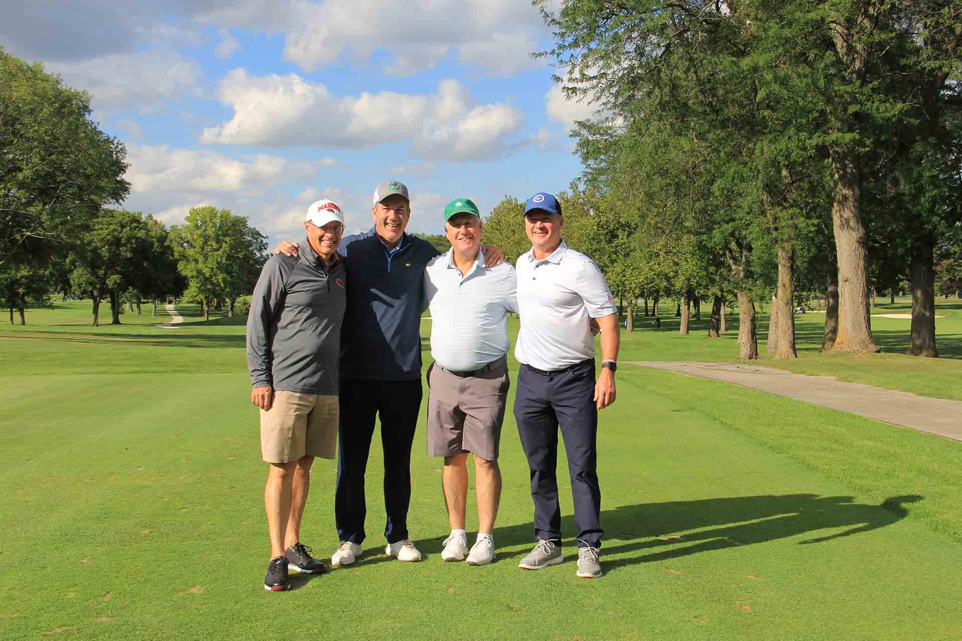 2022-Endowment-Golf-Classic-four-golfers-smiling
