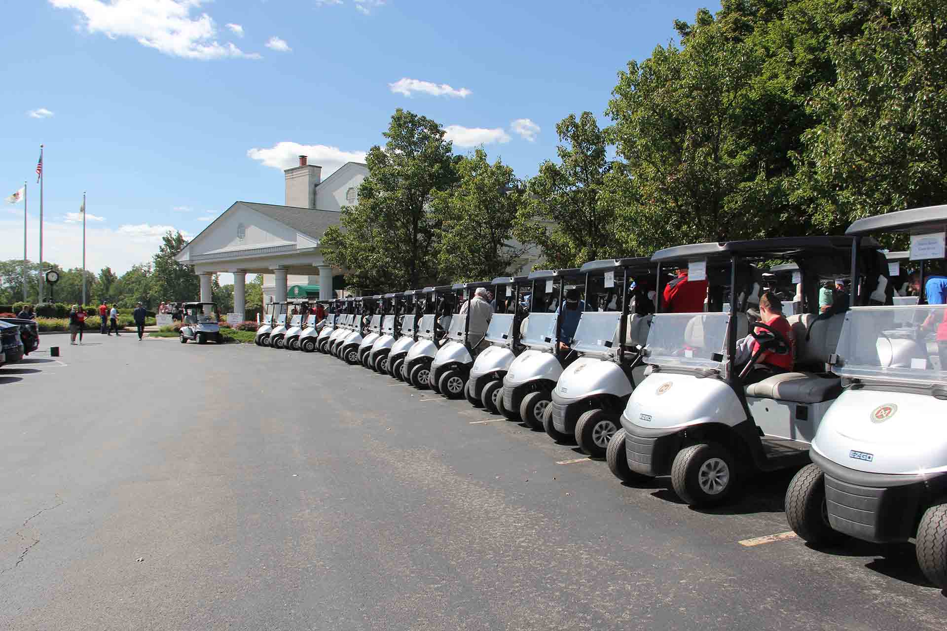 2022-Endowment-Golf-Classic-long-line-of-golf-carts