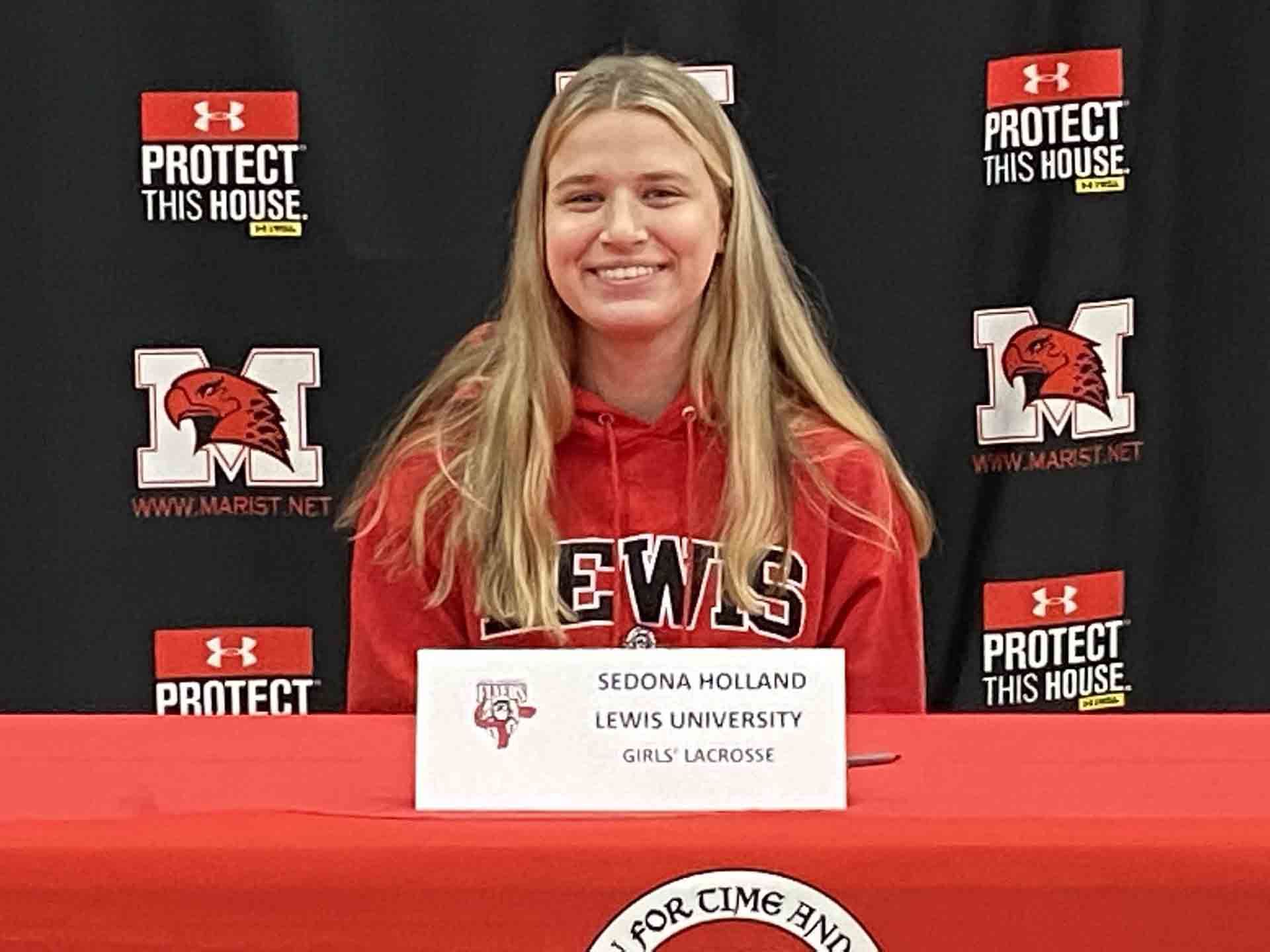 NLI-April-2021-person-signs-to-lewis-smiling