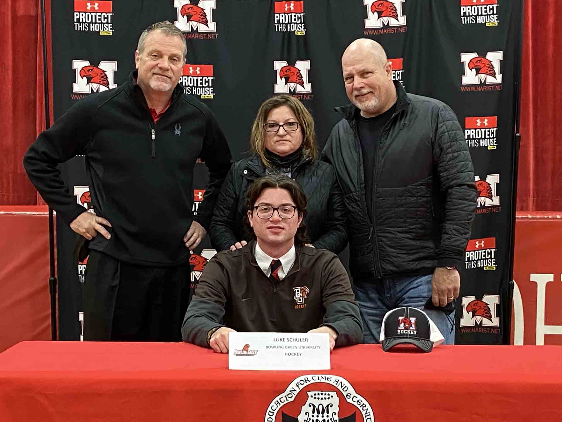 NLI-April-2021-person-with-family-signs-to-bowling-green-university