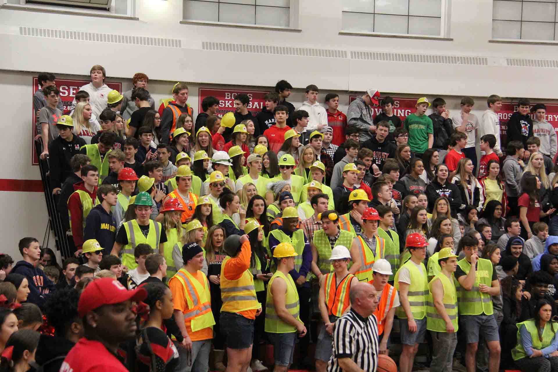 boys-basketball-vs-br-rice-students-wearing-construction-worker-outfits-in-bleachers