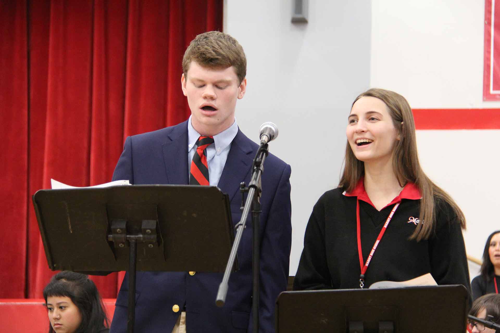 catholic-schools-week-mass-2020-two-students-singing-together