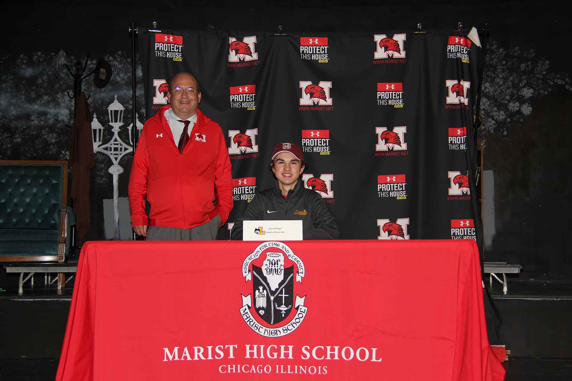 college-signing-november-2021-jake-phillips-with-coach