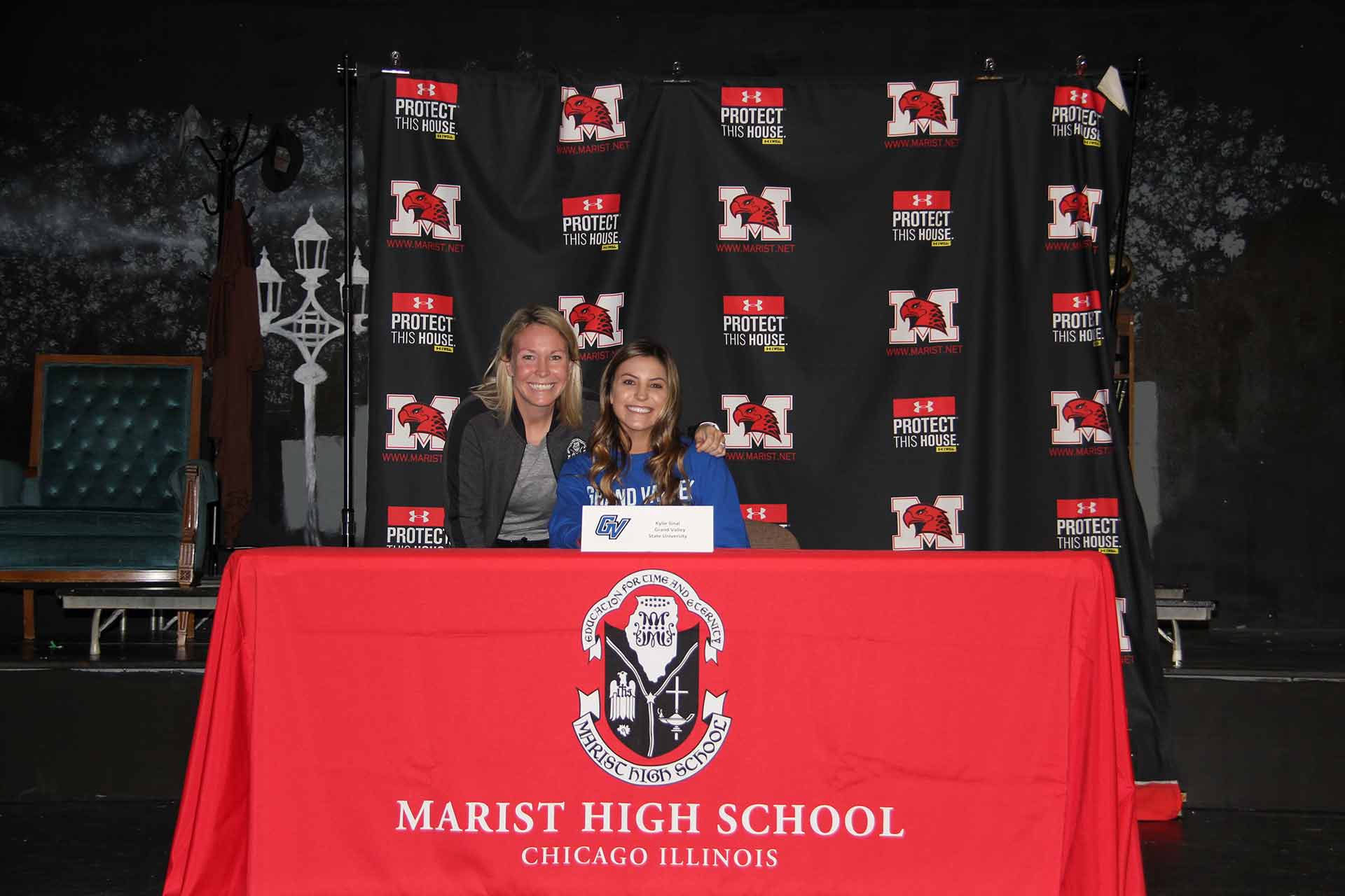 college-signing-november-2021-kylie-sinal-with-coach