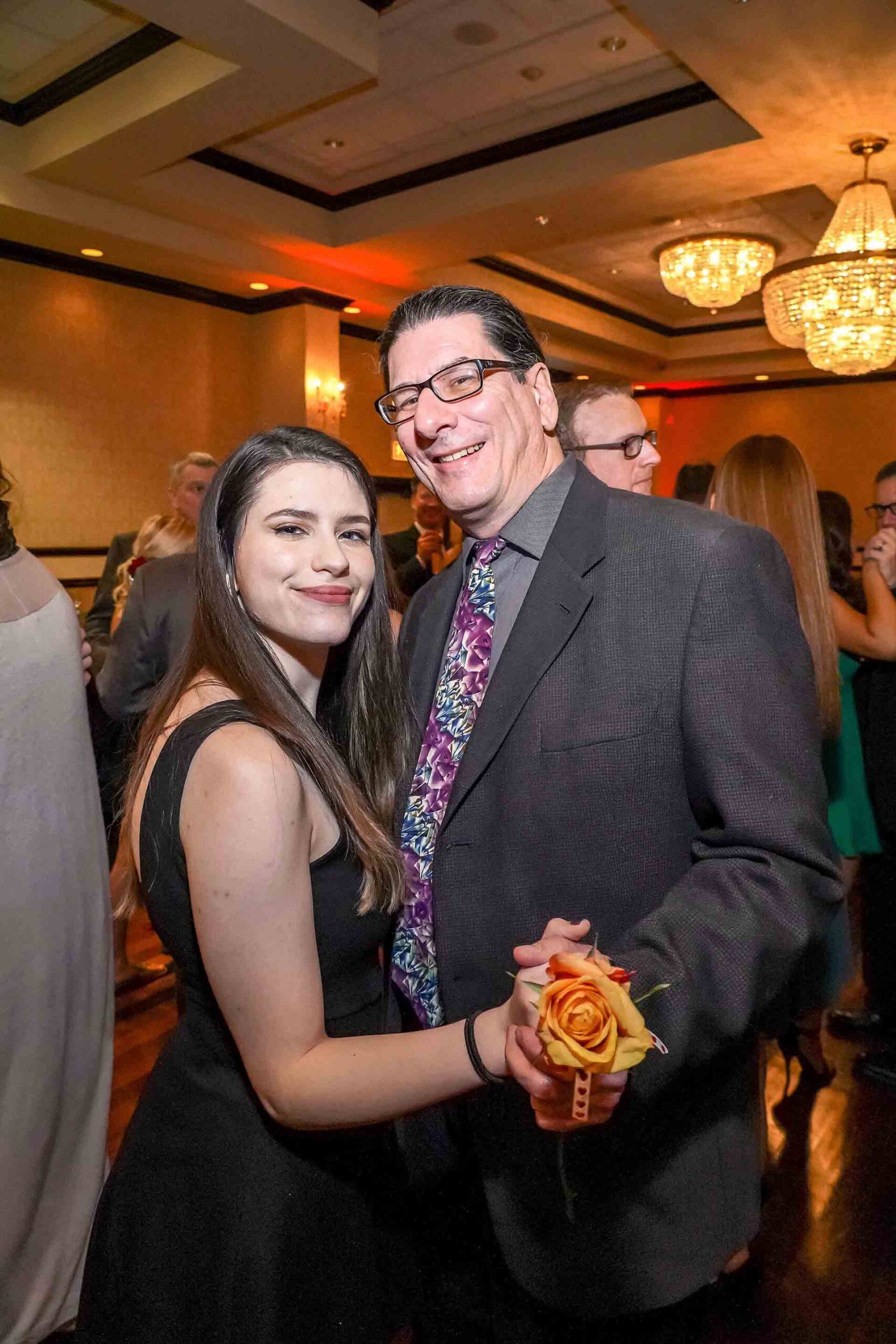 father-daughter-dance-2019-girl-with-orange-flower