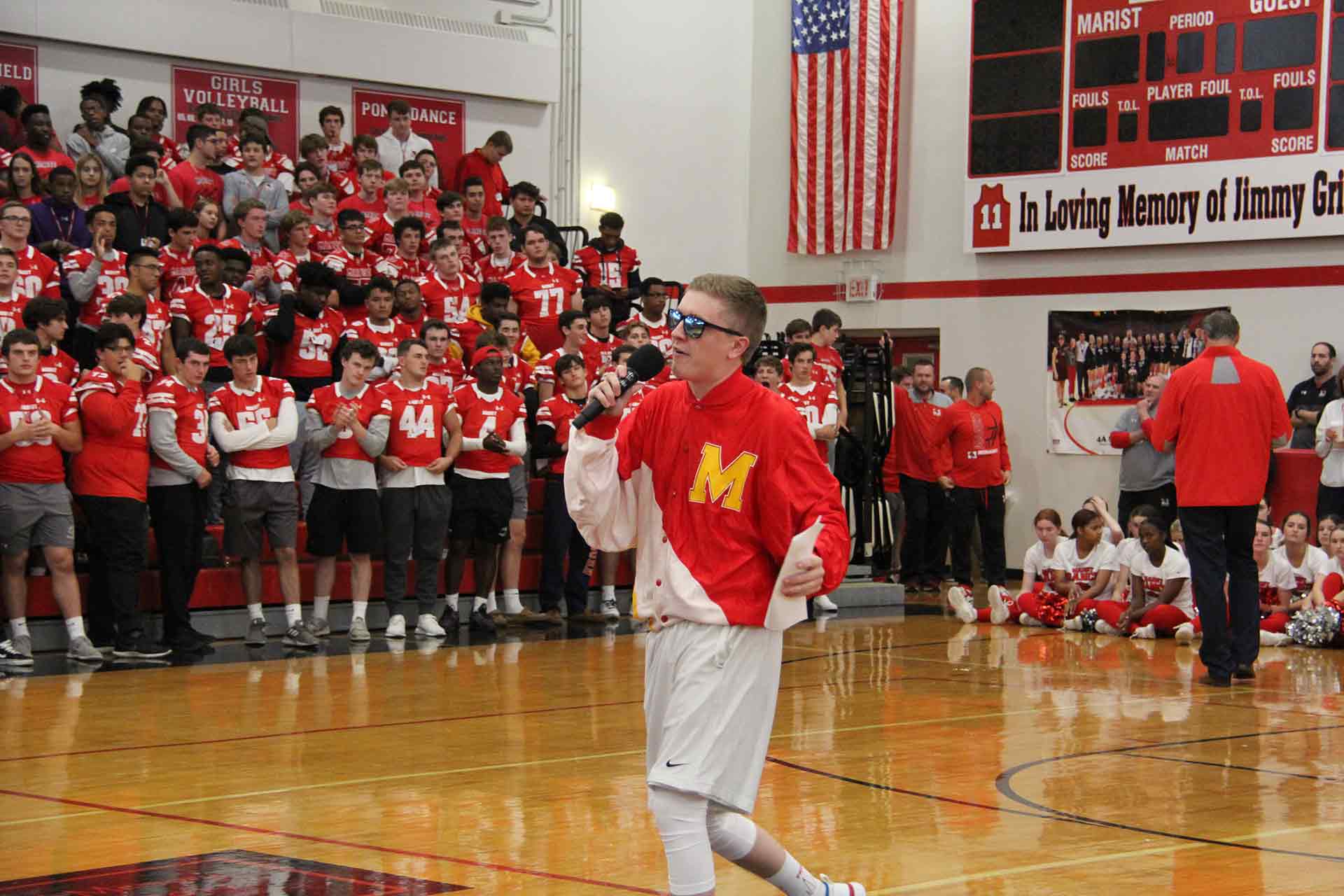 homecoming-rally-2019-student-speaking-with-sunglasses