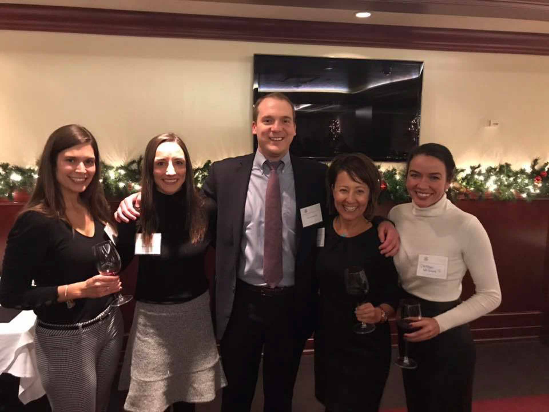 law-association-christmas-social-2019-five-people-smiling