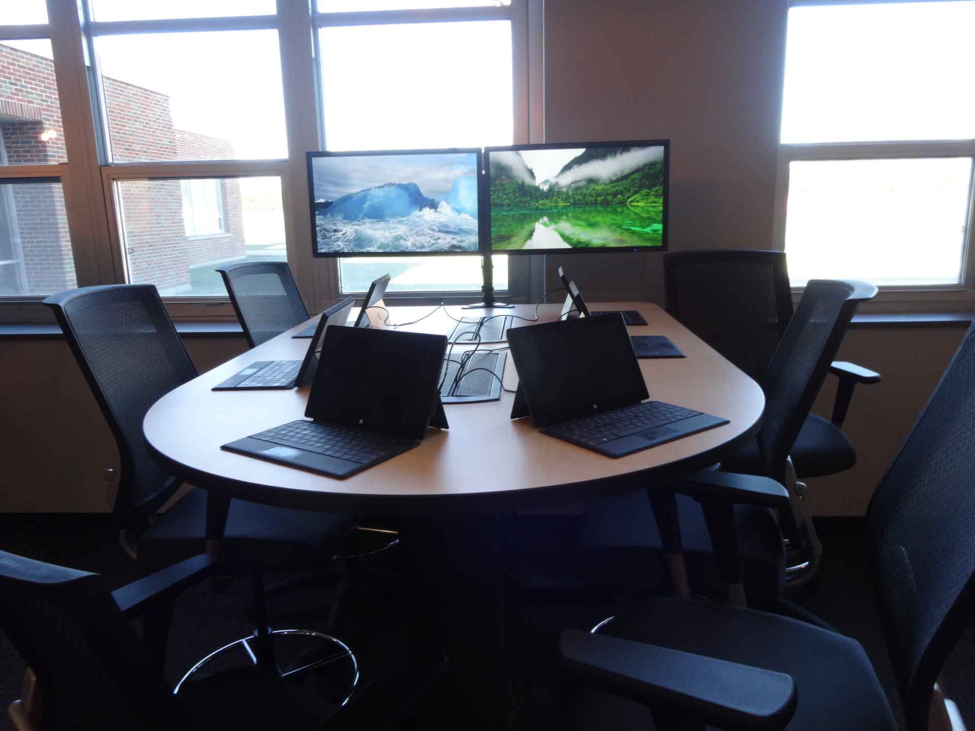 marist-idea-program-desks-with-laptops-and-montiros-by-windows