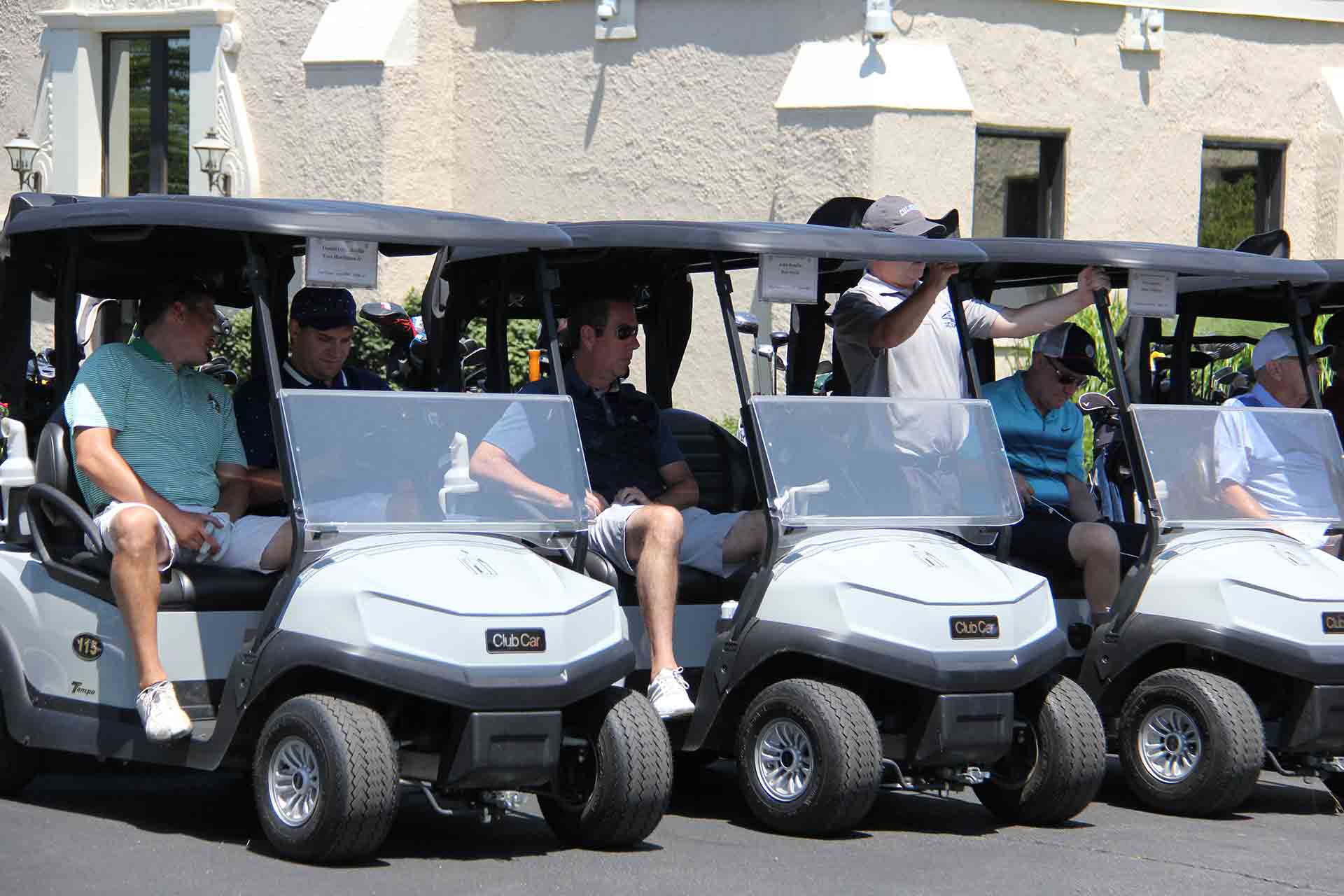 marist-law-association-golf-outing-men-sitting-in-golf-carts
