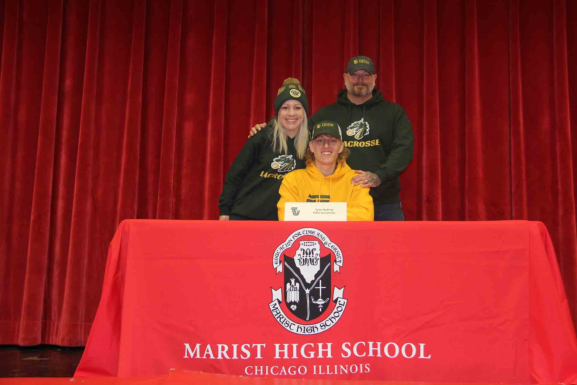 marist-student-with-family-sign-to-tiffin-university