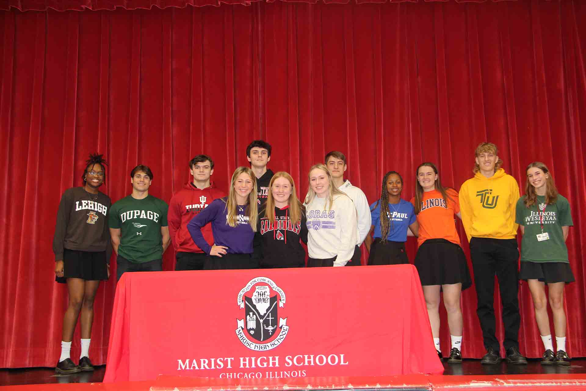 marist-students-pose-for-group-photo-at-college-signing