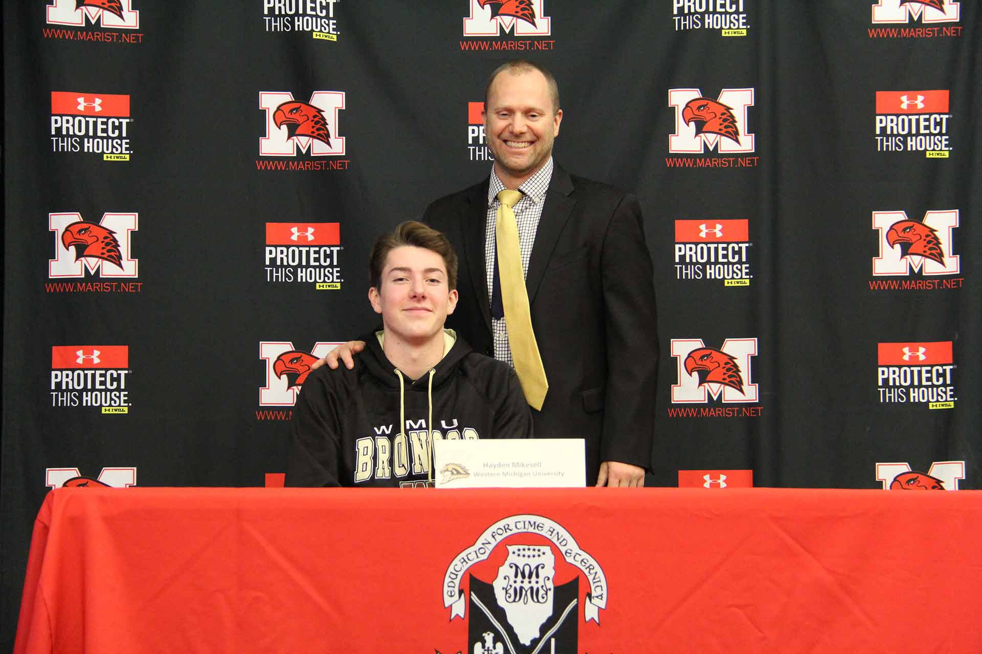 nli-signing-february-2020-hayden-mikesell-with-coach