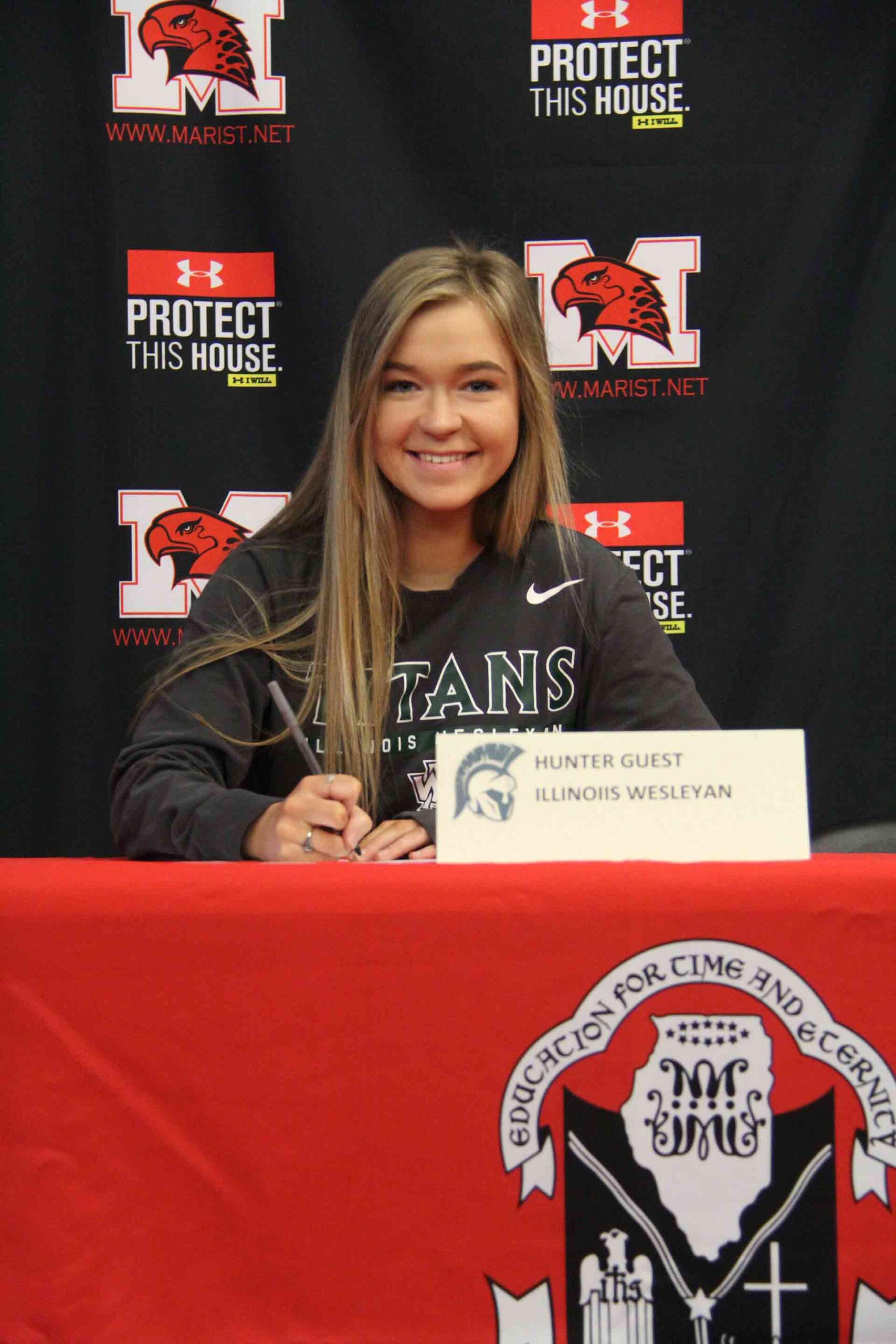 nli-signing-february-2020-hunter-guest-smiling