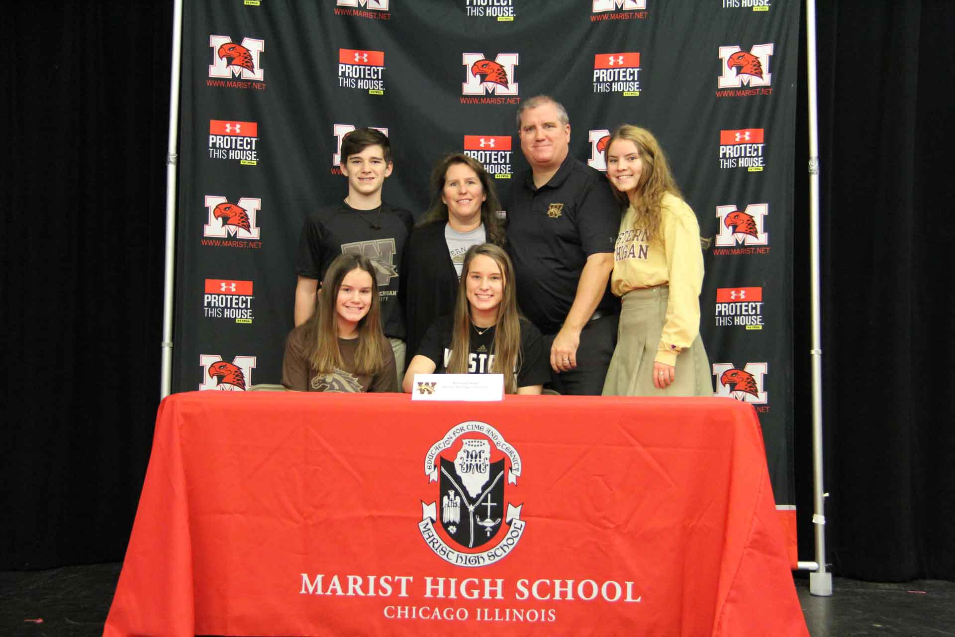 nli-signing-november-2019-highschooler-signs-to-college-with-family