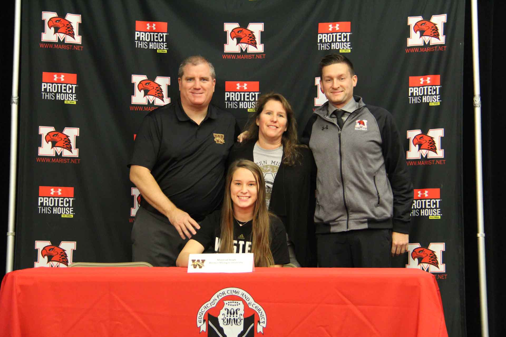 nli-signing-november-2019-parents-with-highschooler-and-faculty-member