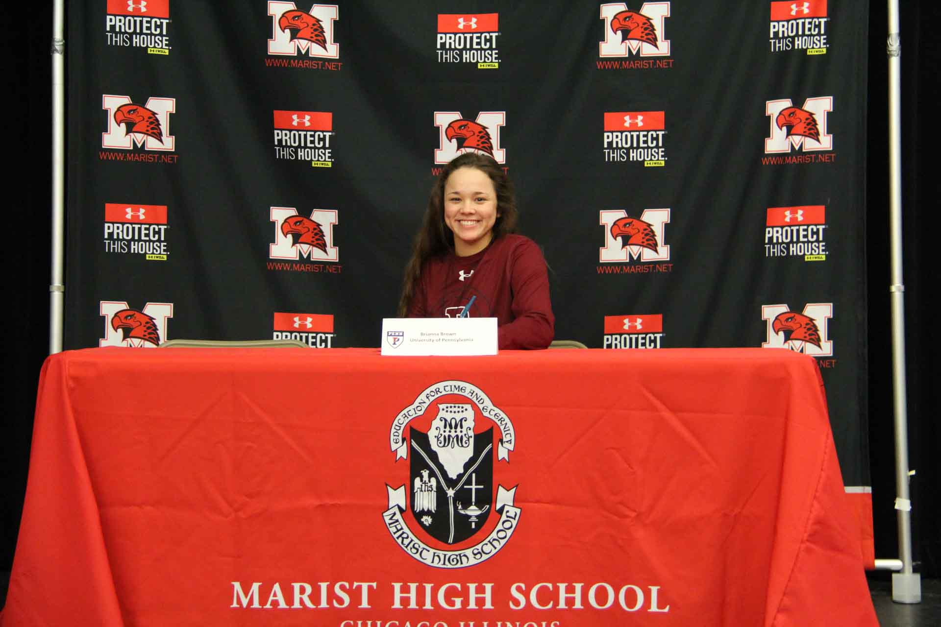 nli-signing-november-2019-person-smiles-at-college-signing