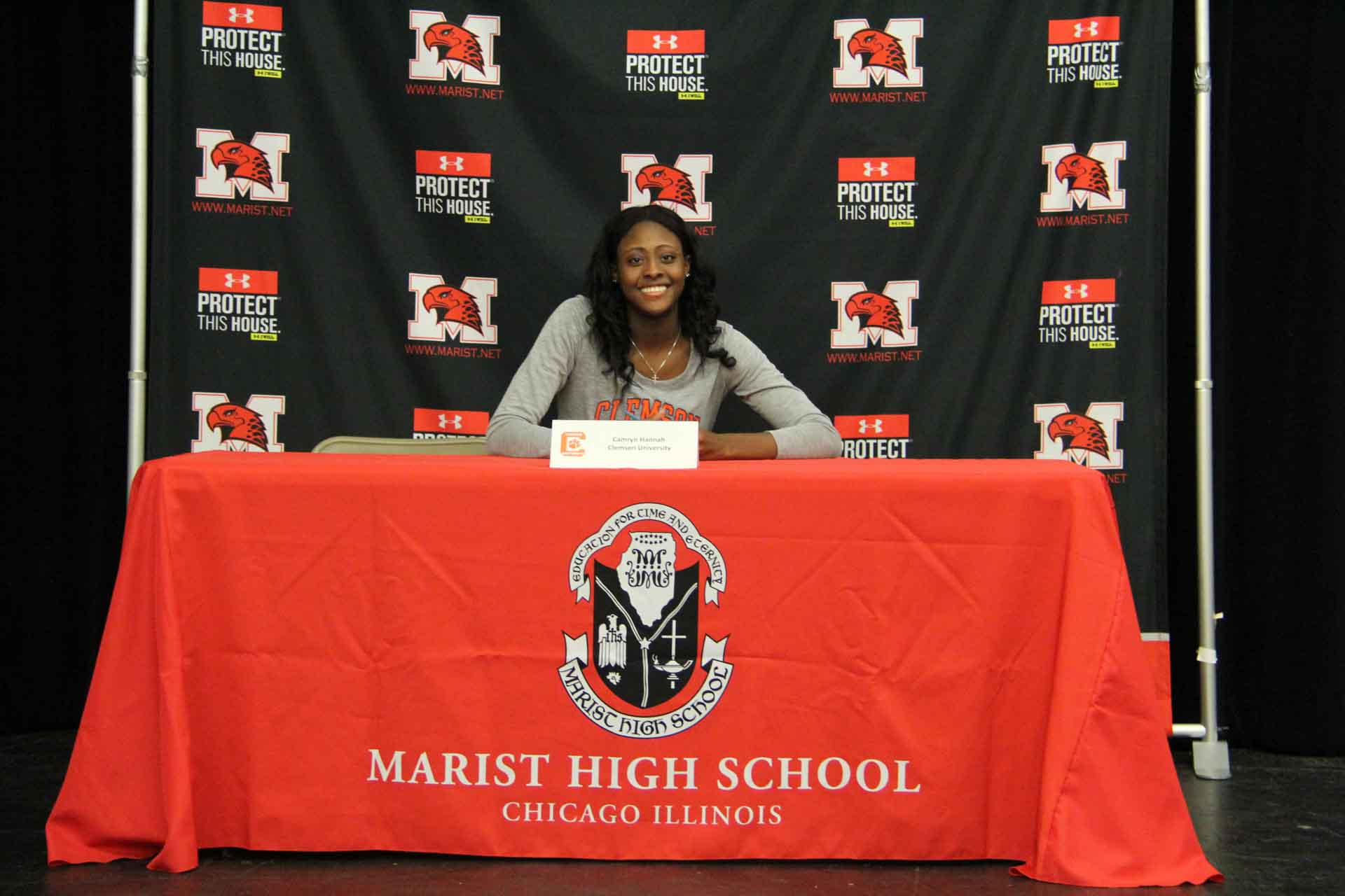 nli-signing-november-2019-person-smiles-while-signing-to-clemson