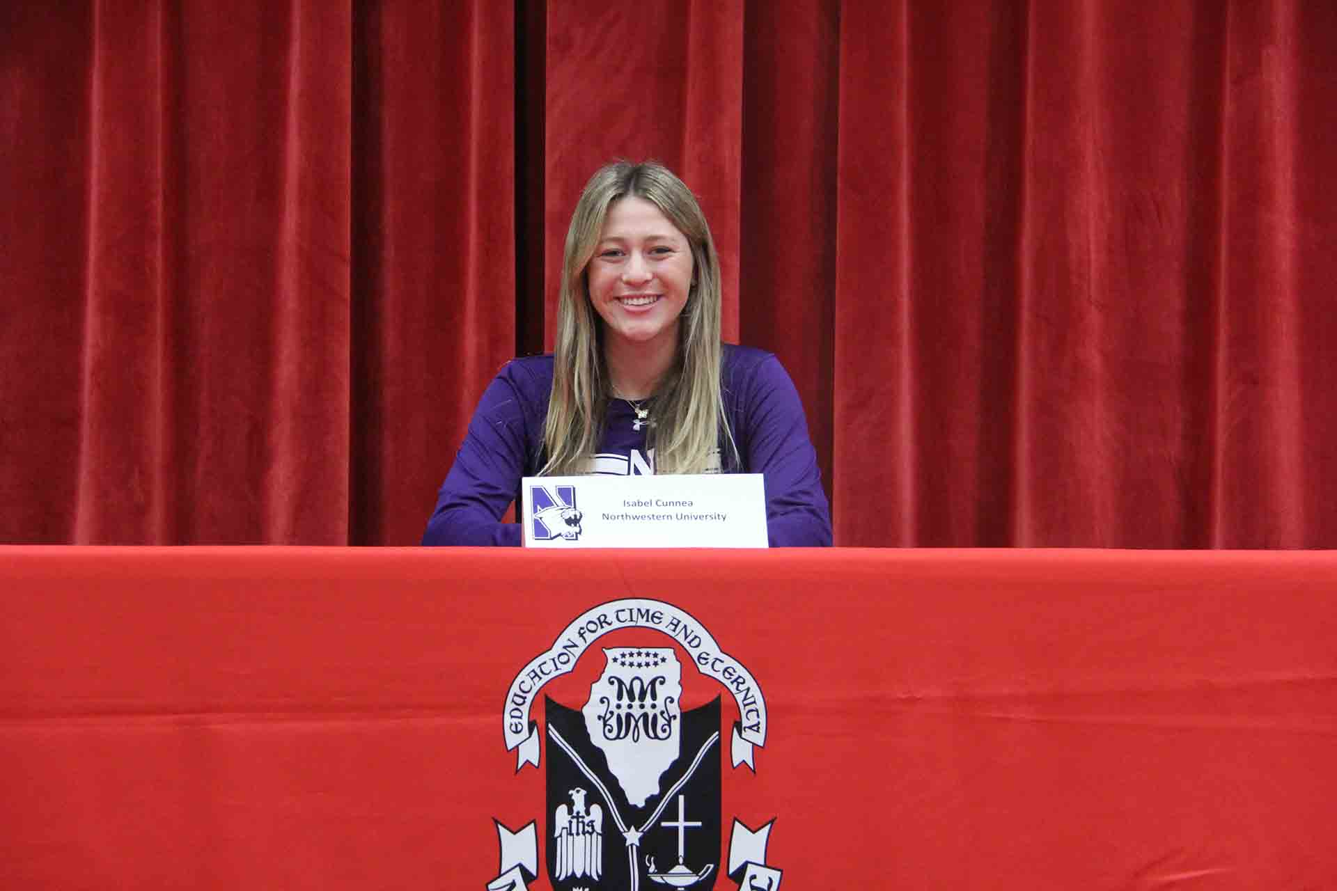 student-smiles-while-signing-to-northwestern
